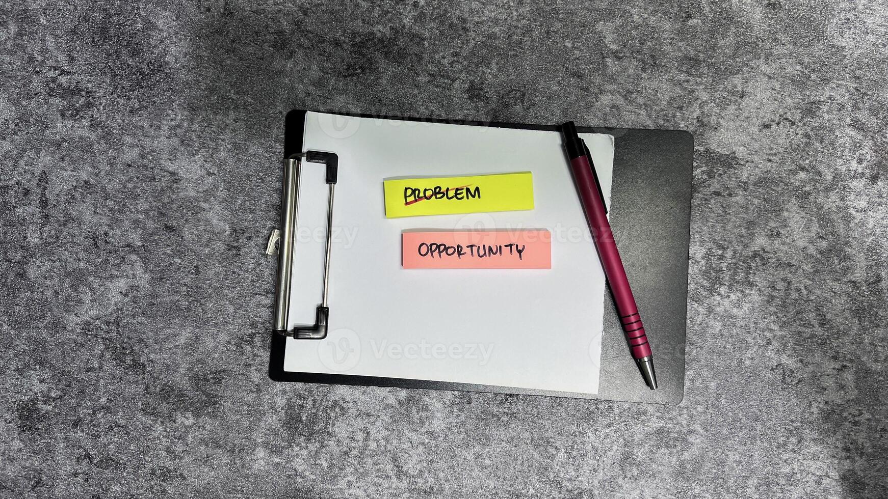 Concept of Problem crossed out and opportunity write on sticky notes isolated on Wooden Table. photo