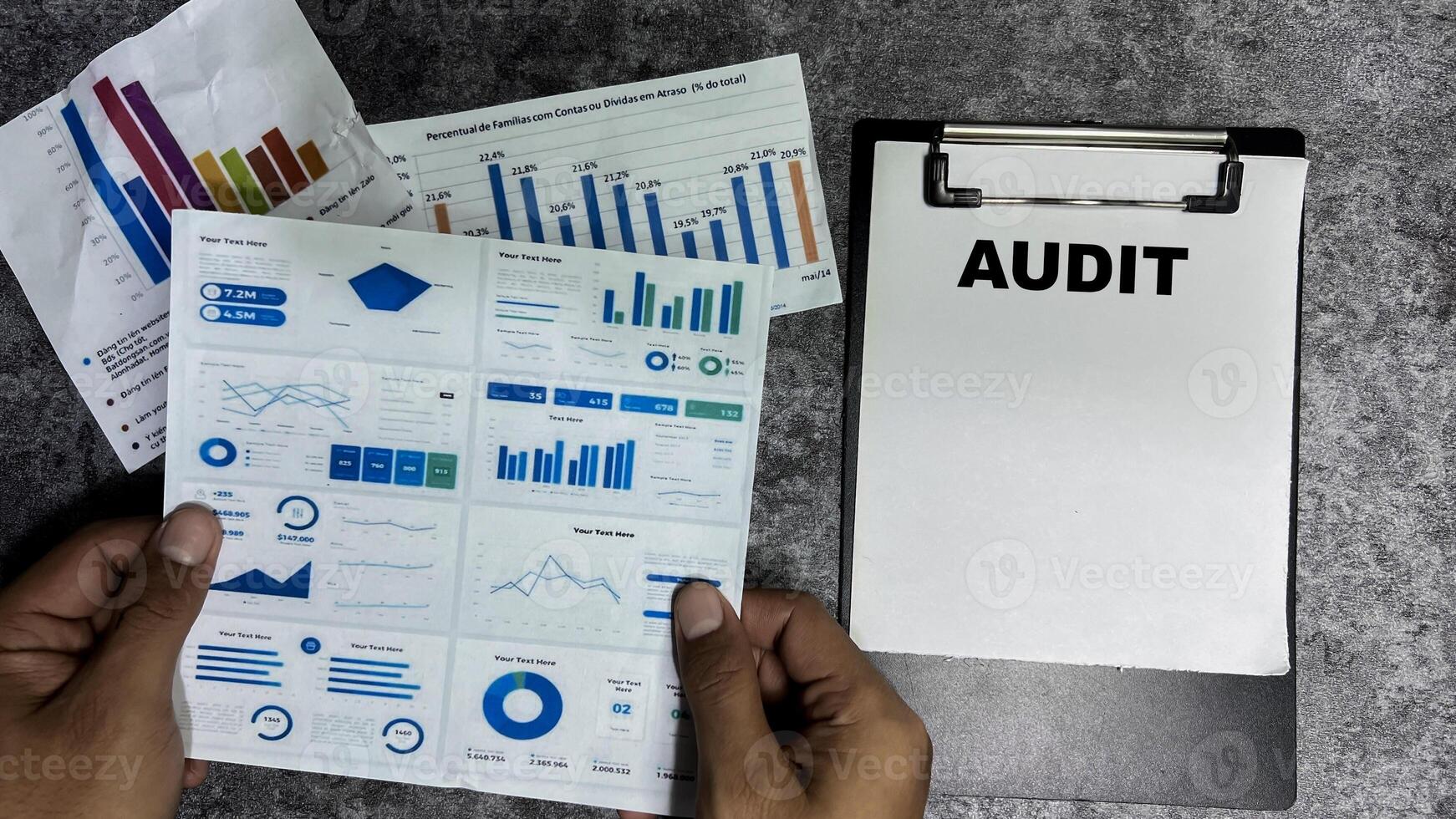 Concept of Audit write on paperwork isolated on Wooden Table. photo