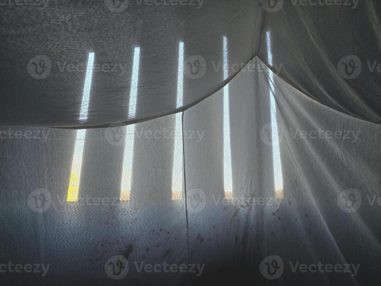 a closeup shot of a white mosquito net photo
