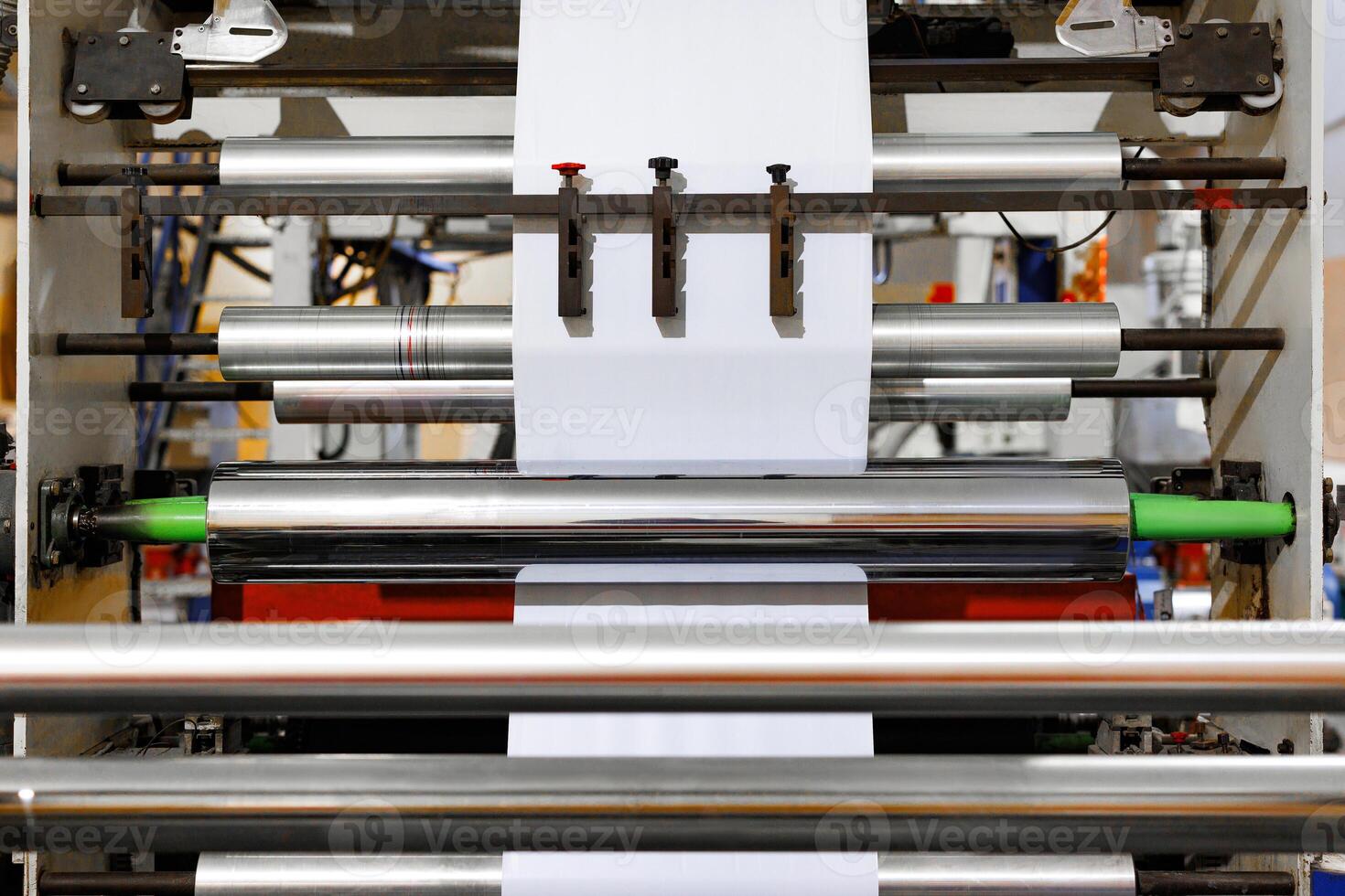 Industrial Symphony The Complex Dance of Printing Machinery Unfolds photo