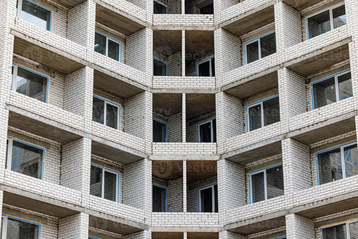 Balconies in Progress A Buildings Emerging Facade Showcasing Architectural Transformation Amidst Ongoing Construction. photo