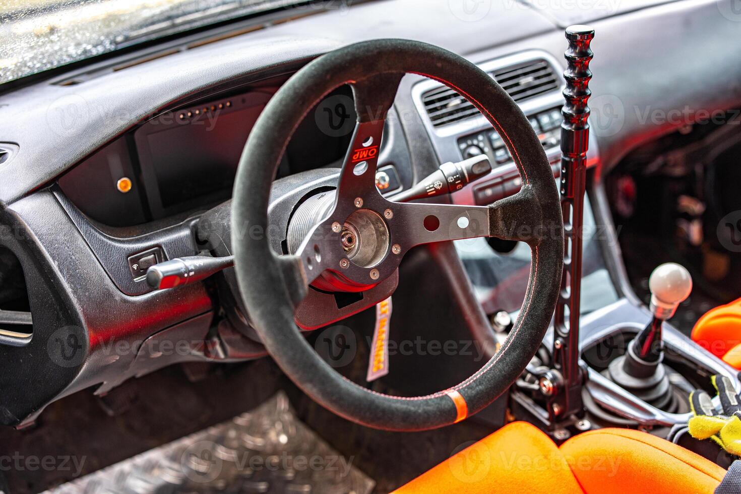 Journey Begins Capturing the Heart of Adventure, a Cars Interior with a Sleek Steering Wheel and Bold Gear Shift Awaiting the Open Road. photo