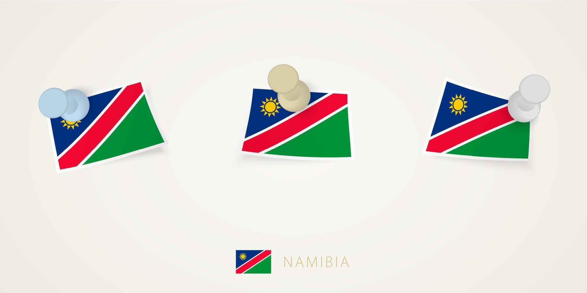 Pinned flag of Namibia in different shapes with twisted corners. pushpins top view. vector