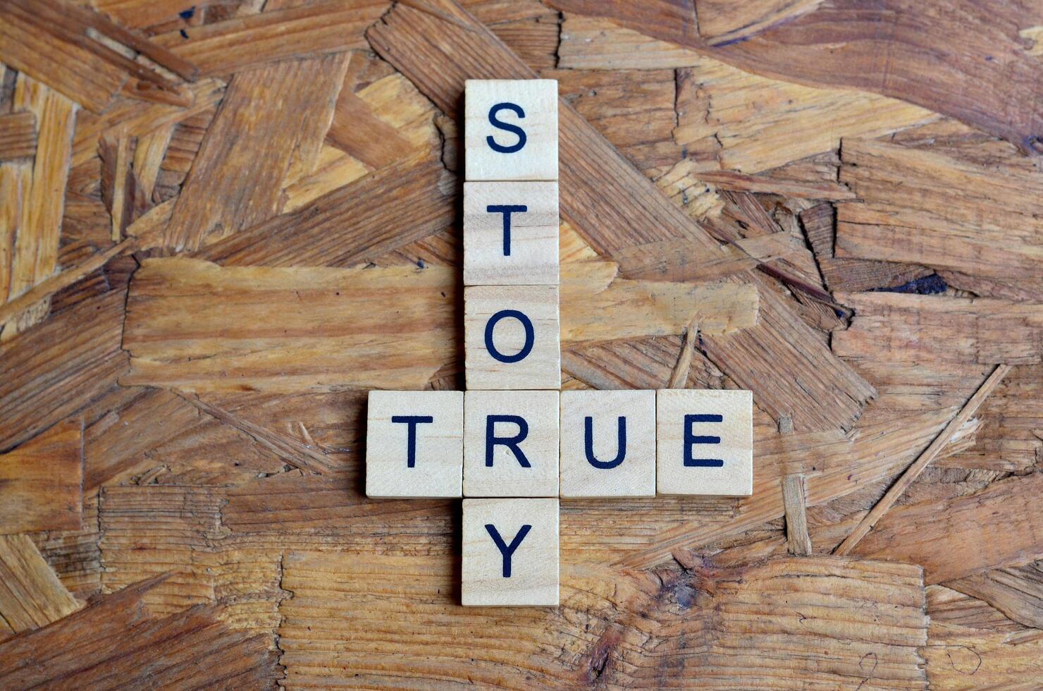 true story text on wooden square photo