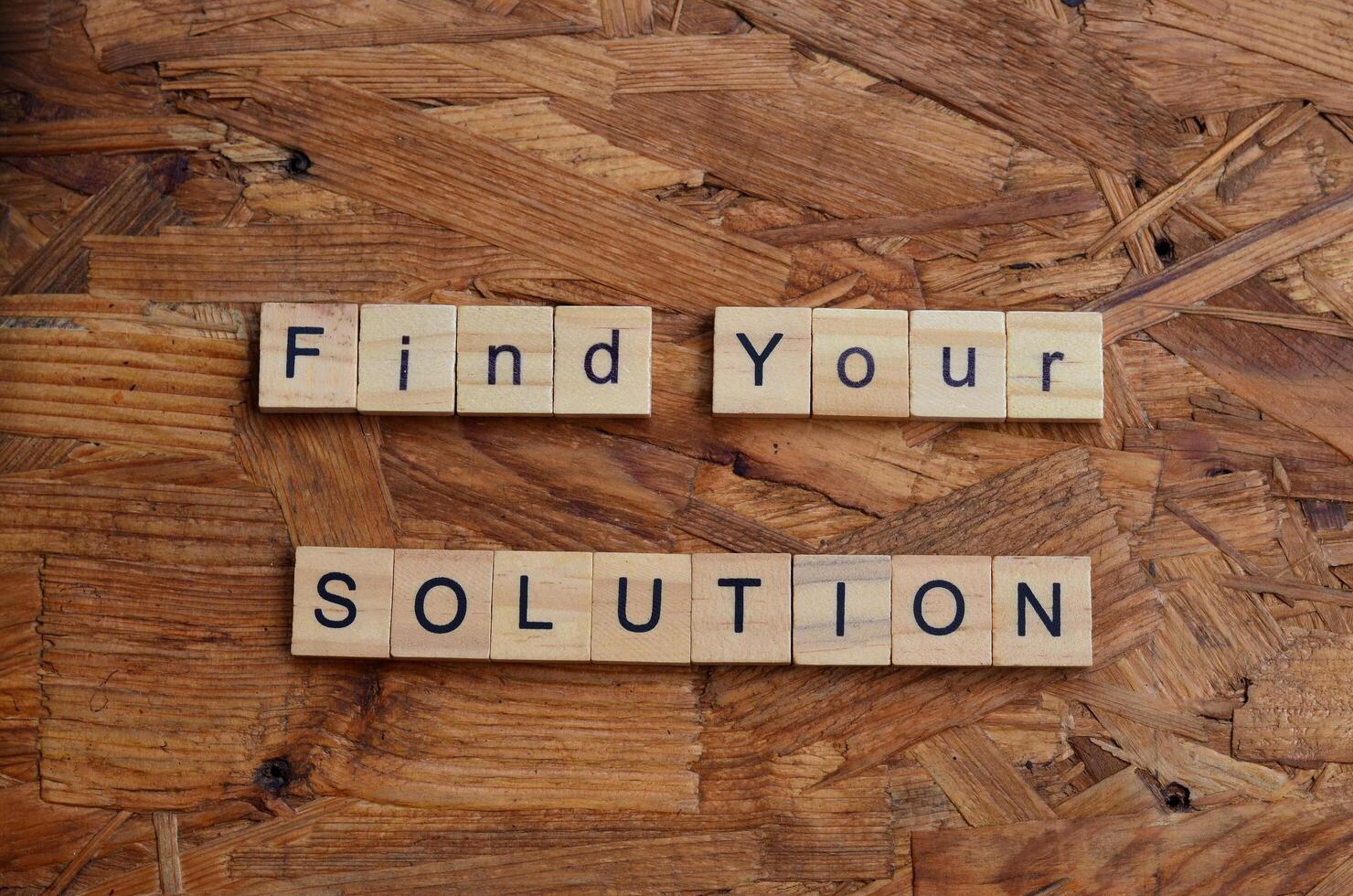 follow your solution text on wooden square photo