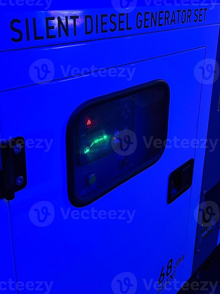 Silent diesel generator set with illuminated control panel photo