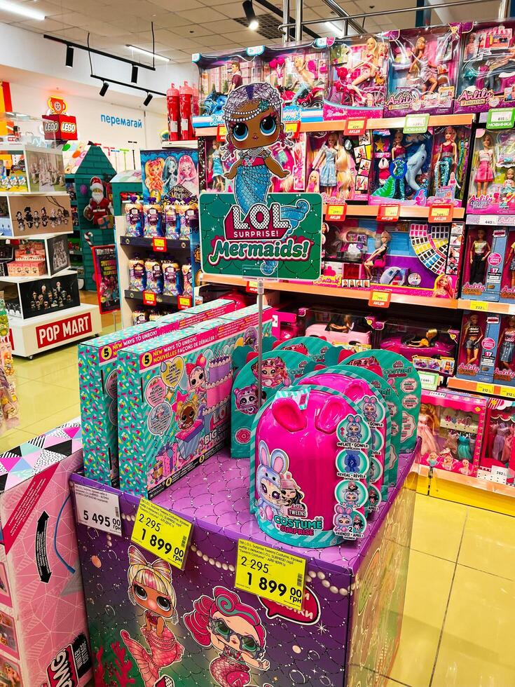 Kyiv, Ukraine - November 20, 2024 Colorful toy store display featuring LOL Surprise Mermaids photo