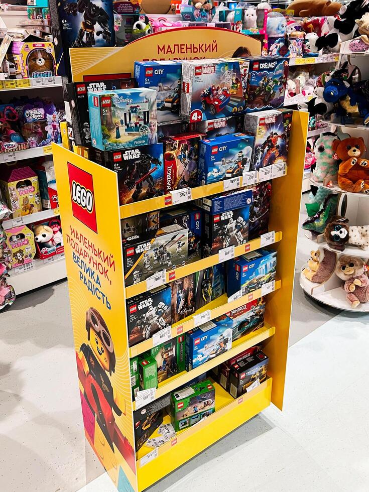 Kyiv, Ukraine - November 20, 2024 Colorful toy store display featuring popular LEGO sets and toys photo