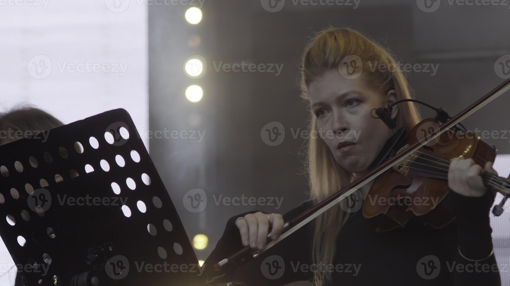 An Exceptional Violinist Performing Live with Genuine Passion and Artistic Expression. Clip photo