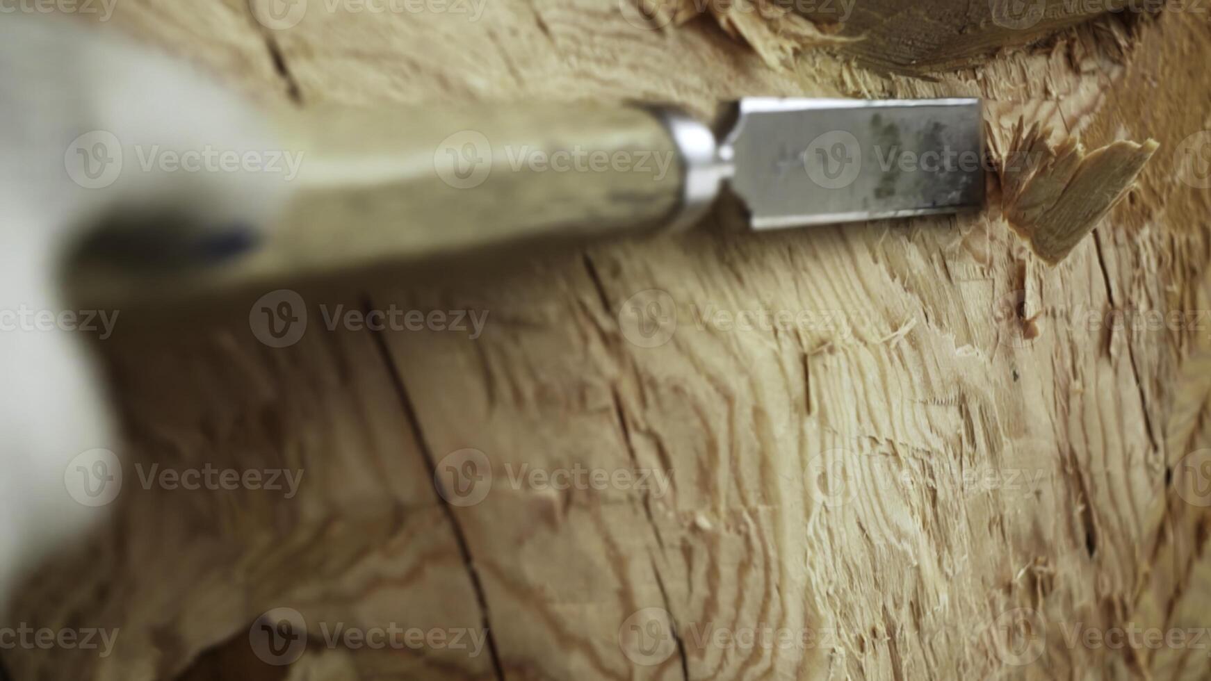 The Intricate and Detailed Wood Carving Process Using a Chisel in Artisan Craftsmanship. Stock Clip photo