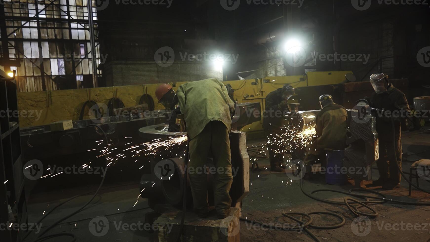 Nighttime Industrial Workshop Witness the Craftsmanship in Action, Where Skills Shine Brightly. Stock Clip photo
