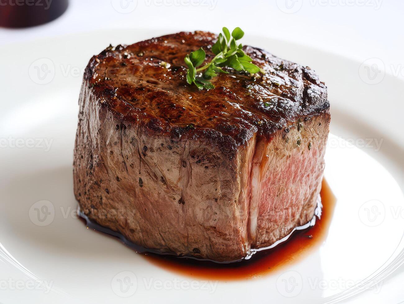 Beef steak with thyme on a white plate, close up photo