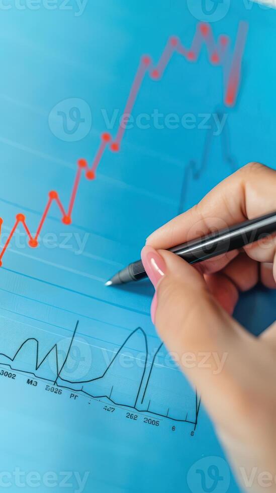 Businessman analyzing investment charts on a virtual screen. Stock market concept. photo