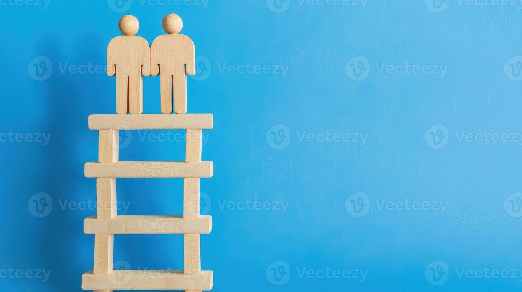 Businessman standing on ladder on blue background. Concept of career growth photo