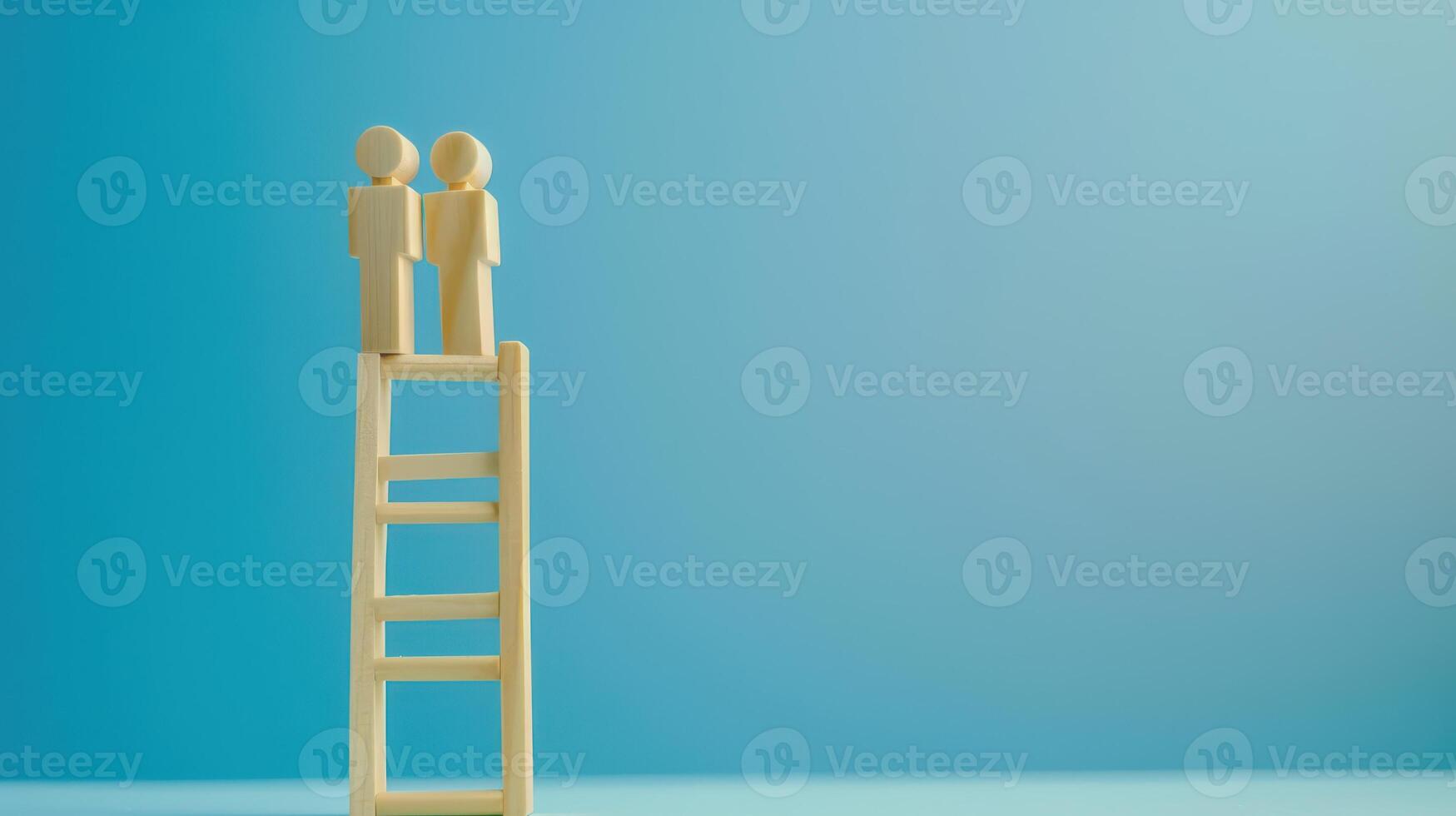 Businessman standing on ladder on blue background. Concept of career growth photo