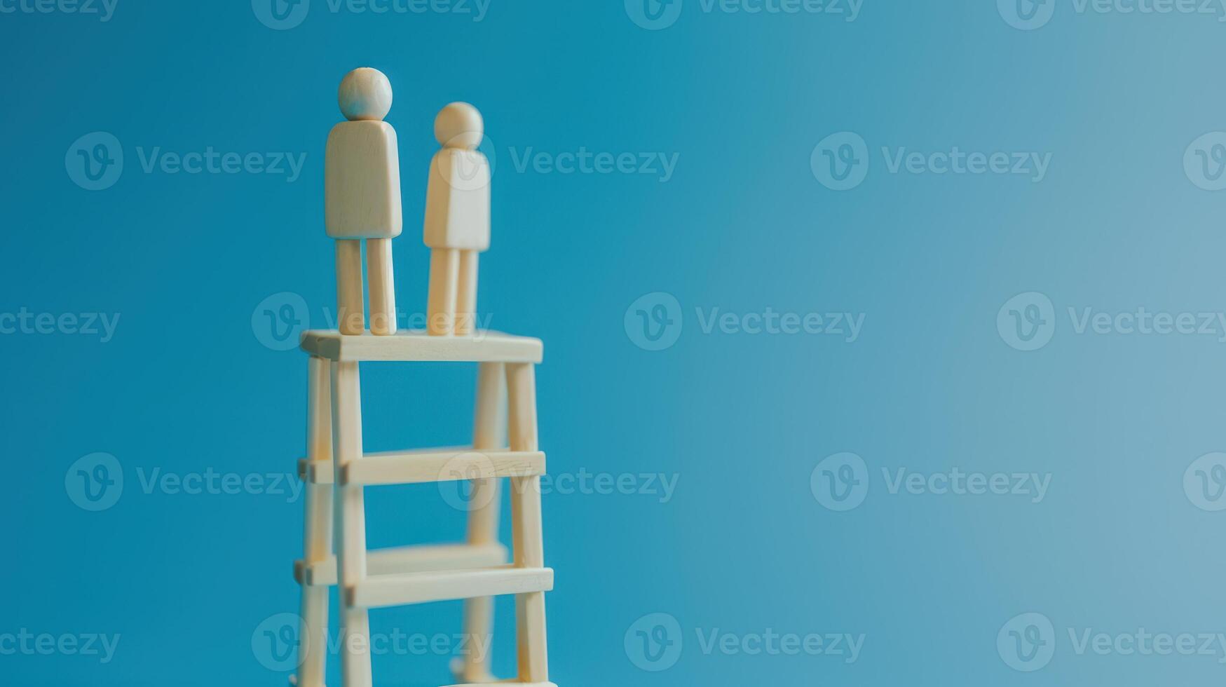 Businessman standing on ladder on blue background. Concept of career growth photo