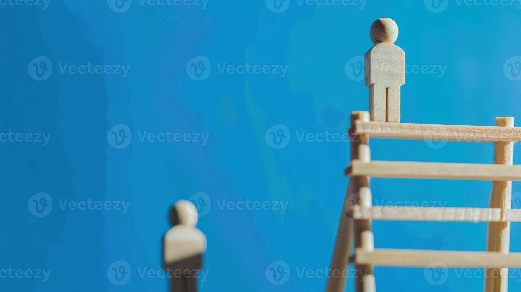 Businessman standing on ladder on blue background. Concept of career growth photo