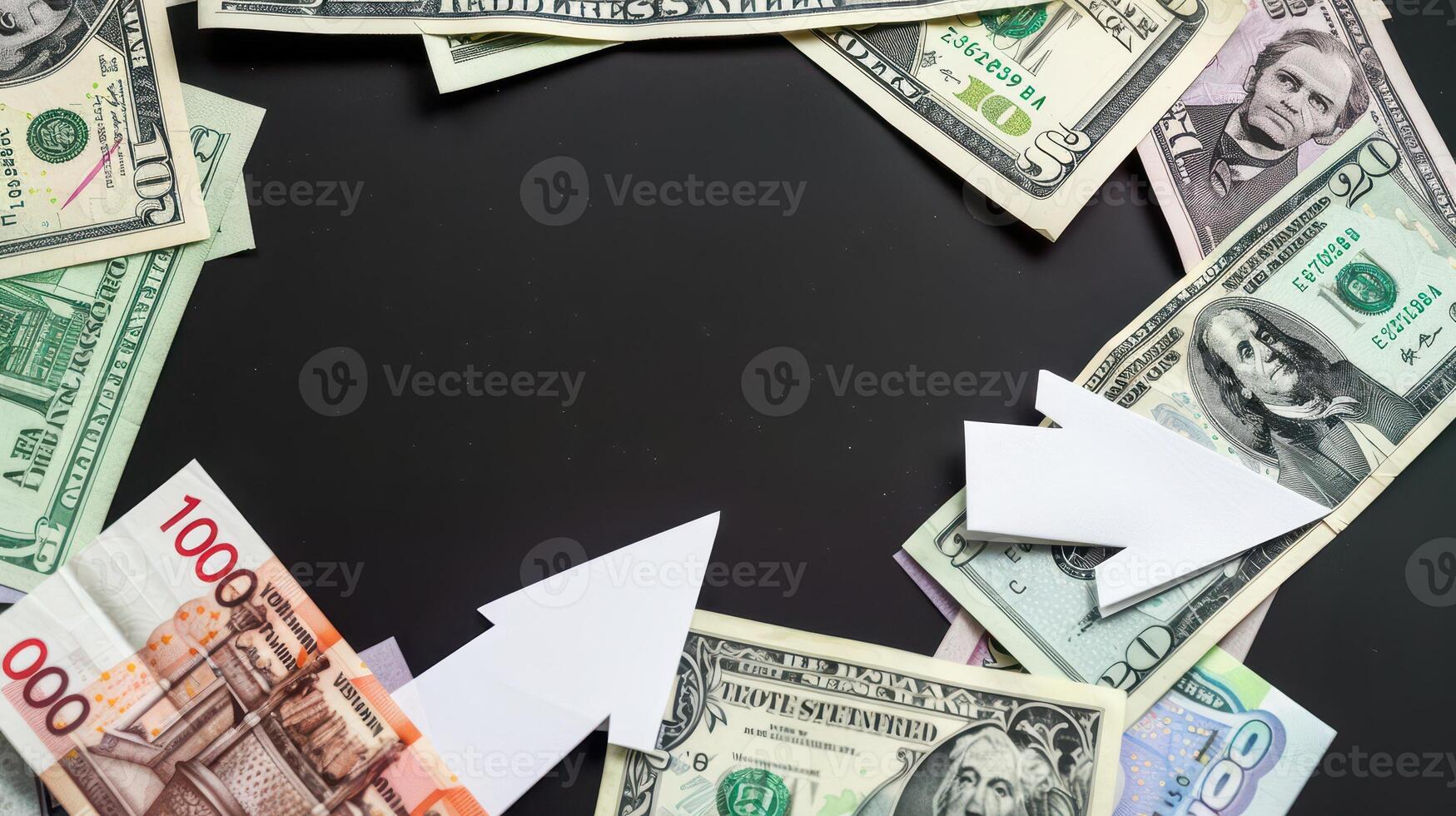 Business and finance concept. Paper arrows and money on black background. photo