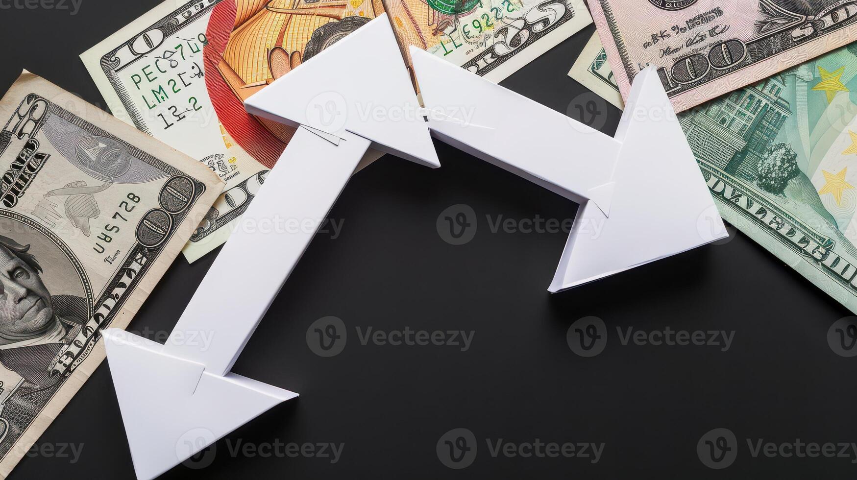 Business and finance concept. Paper arrows and money on black background. photo