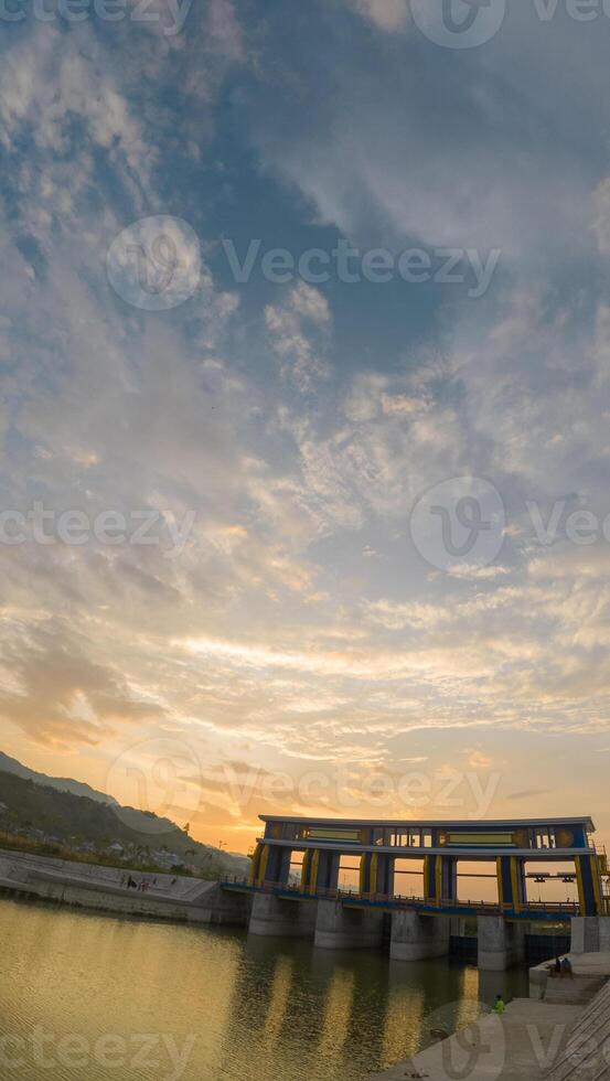 Sunset at the dam in the Gorontalo, Indonesia photo