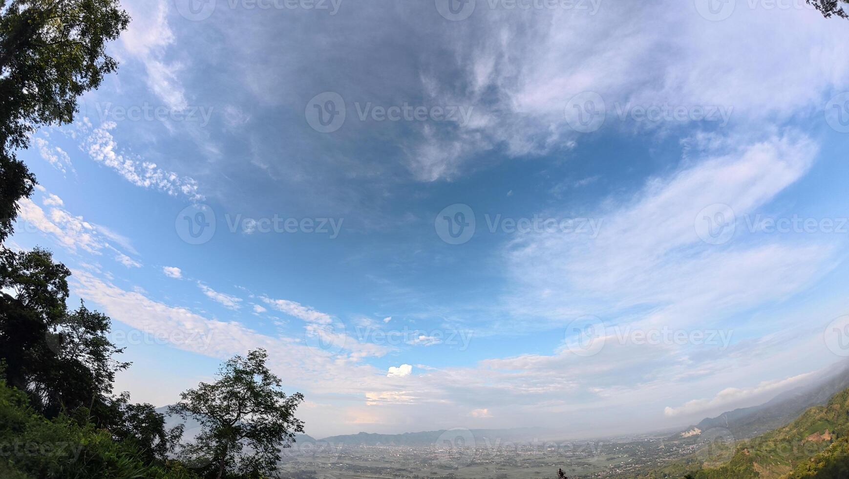 Mountain landscape with blue sky and cloud at Arang Hill, Gorontalo, Indonesia photo