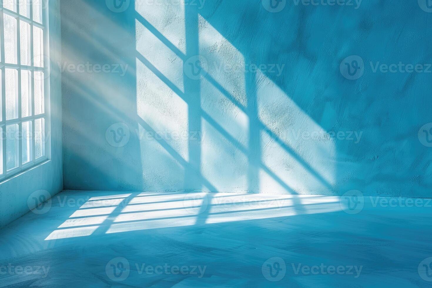Minimal abstract light blue background for product presentation. Shadow and light from windows on plaster wall. photo