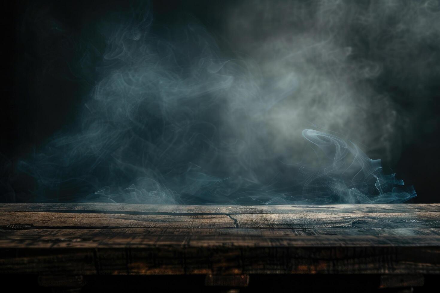 A dark background highlights an empty wooden table where smoke elegantly rises The perfect copy space image to showcase your products photo