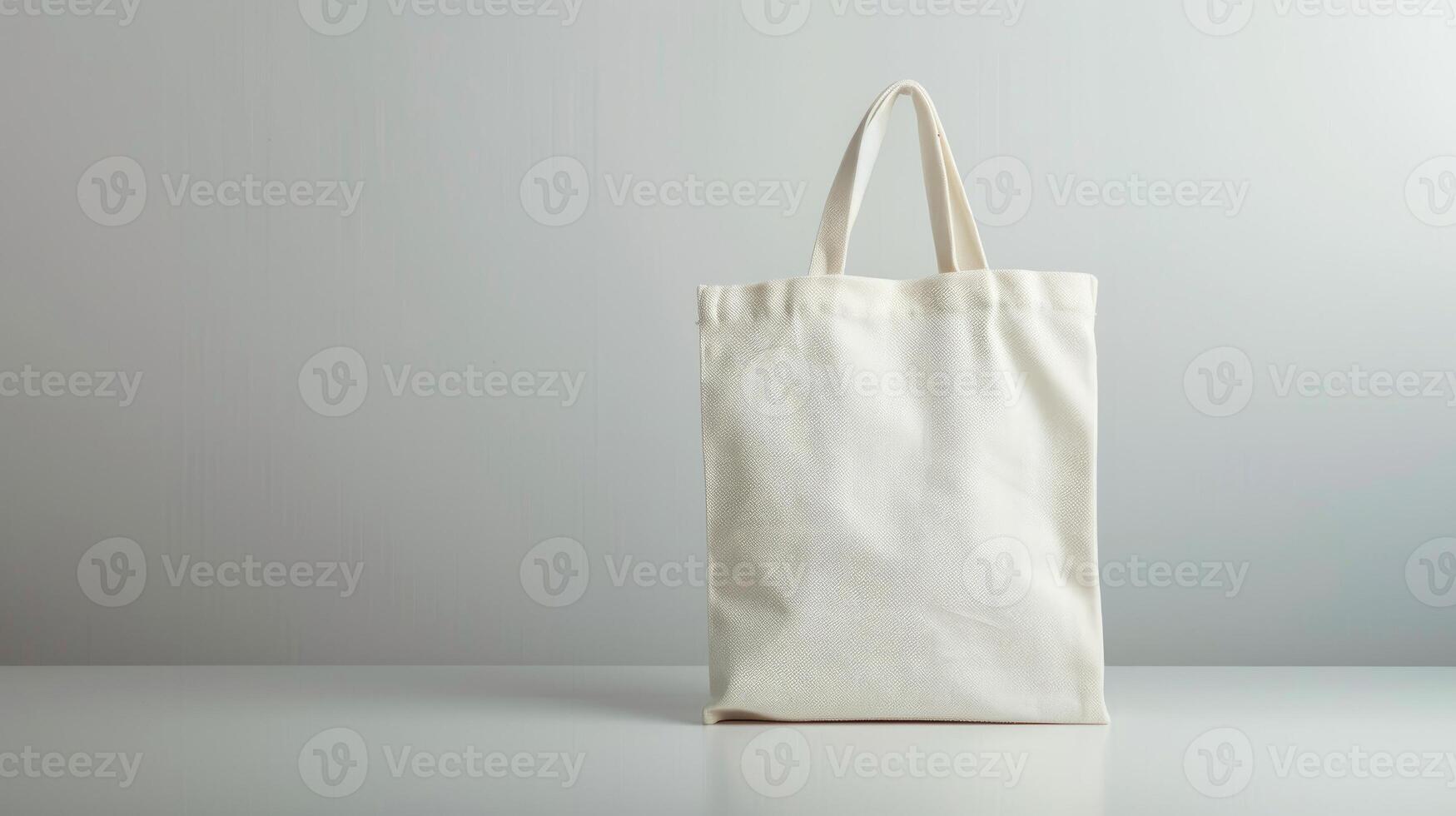 A blank canvas tote bag with copy space image representing the eco friendly and zero waste concept photo