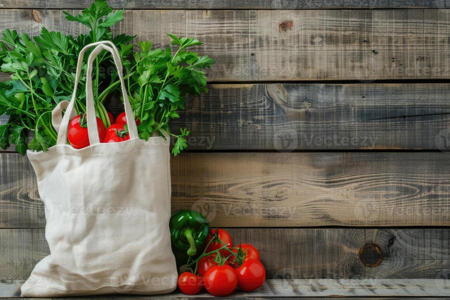 White linen bag with vegetables is placed on a rustic wooden background photo