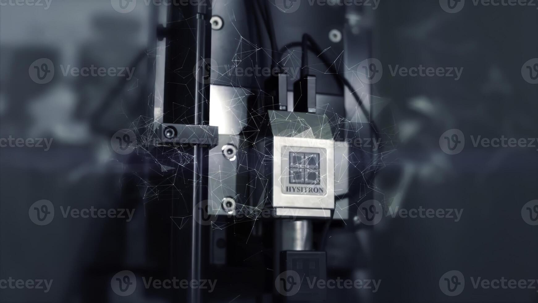 highlights a hightech machine and a camera in a dark room photo
