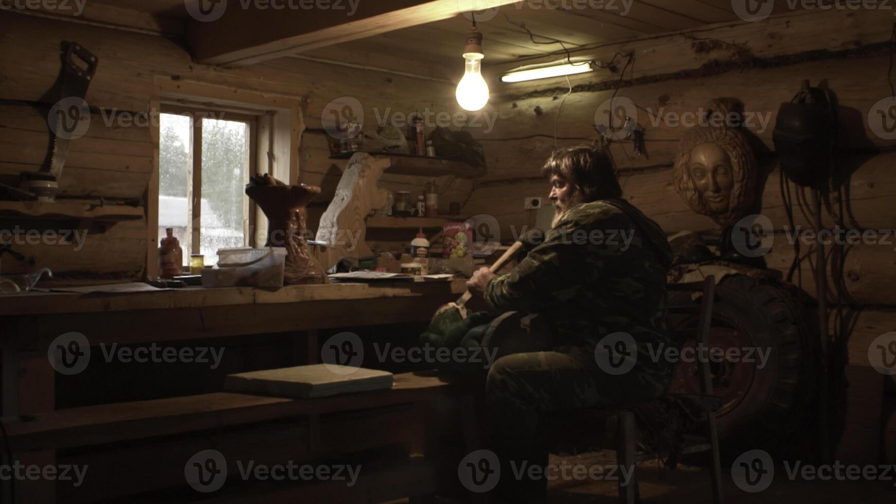 Rustic Retreat Seeking Solitude and Peace in a Cozy Log Cabin Workspace Hideaway. Stock Clip photo
