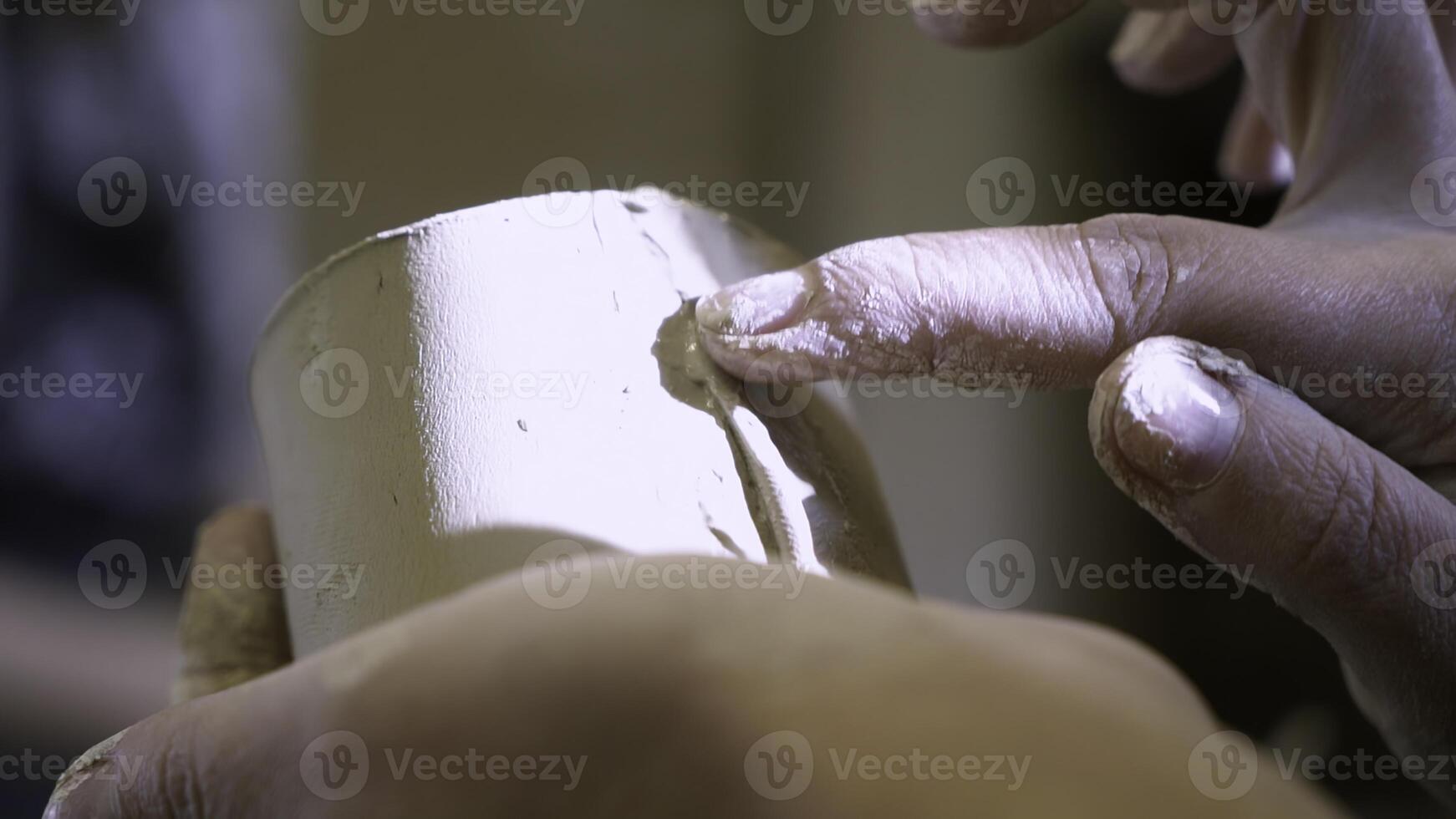 A close up showcasing the intricate craftsmanship of pottery and clay shaping techniques. Stock Clip photo