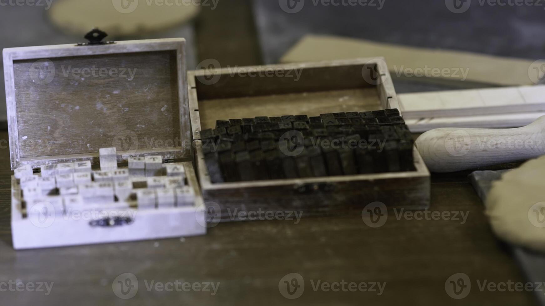 A beautiful collection of vintage wooden letterpress printing blocks and boxes for art and craft. Stock Clip photo