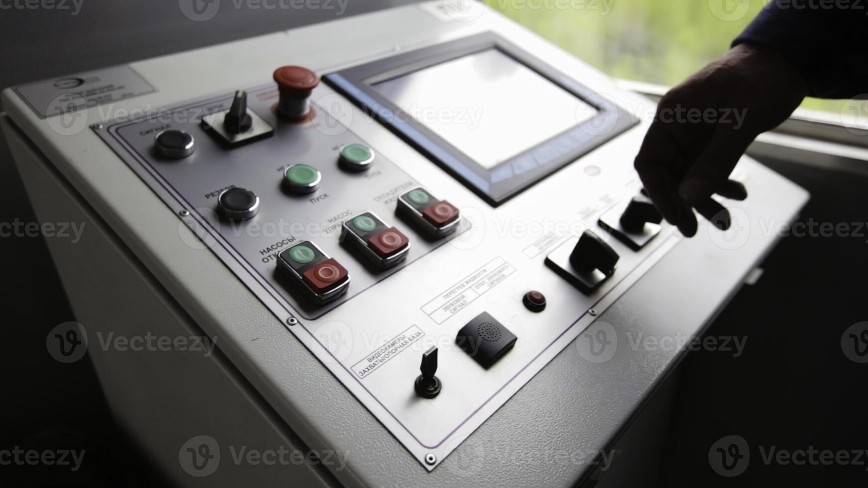 An Industrial Control Panel that features both a Touch Screen Interface and Physical Buttons. Stock Clip photo
