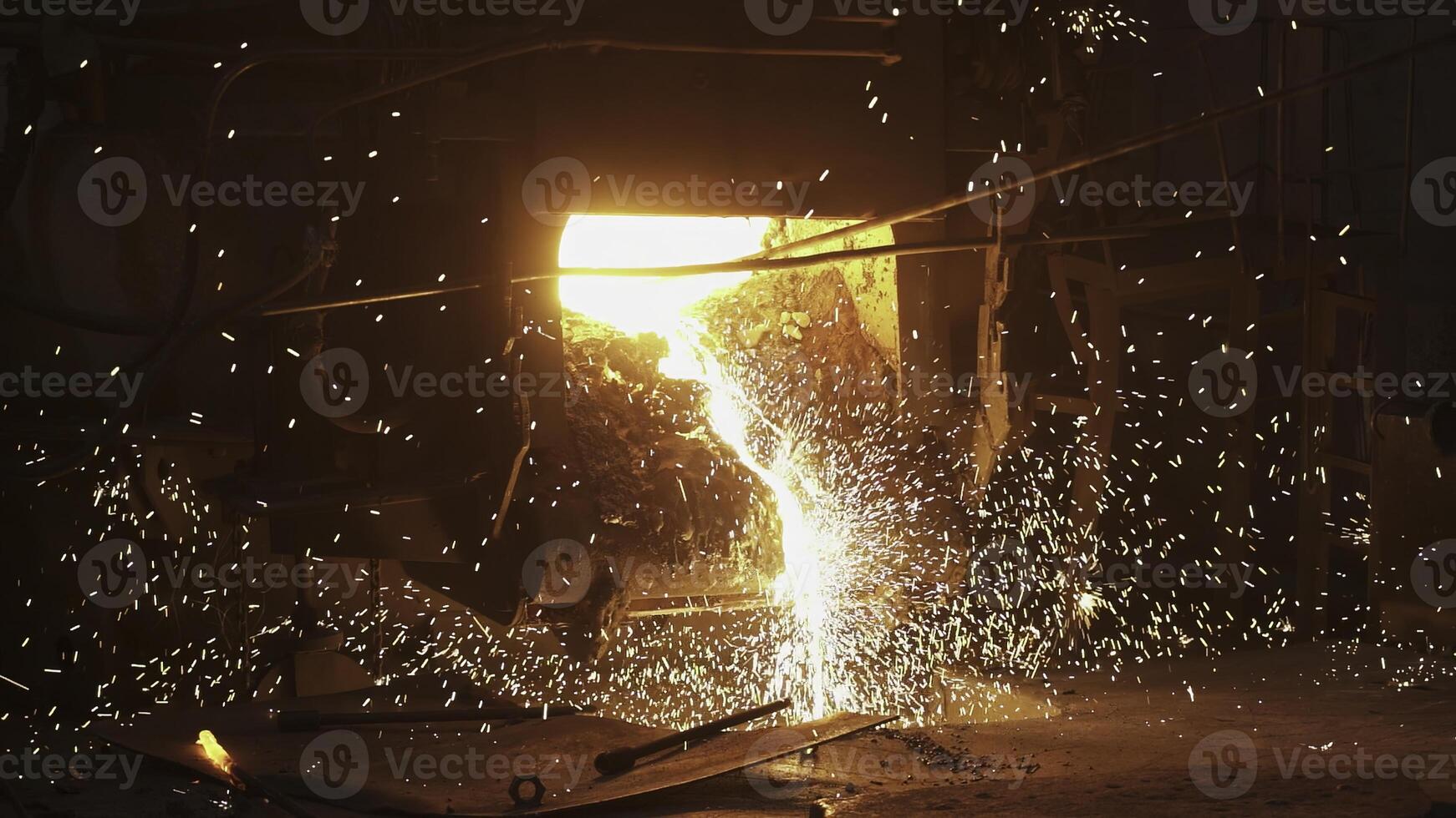 Dynamic Sparks and Molten Metal Captured in an Engaging Industrial Scene of Activity. Stock Clip photo