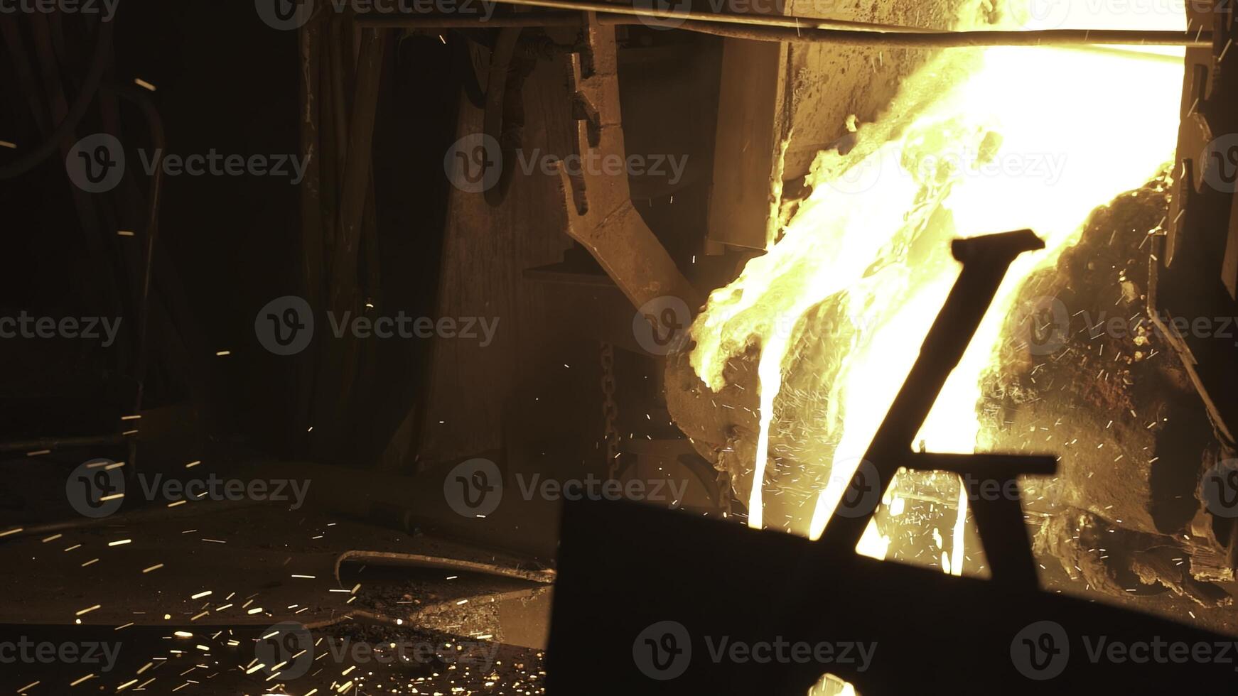 Intense and Dramatic Flames Erupting Vigorously from a Fire Source Looming in the Night. Stock Clip photo