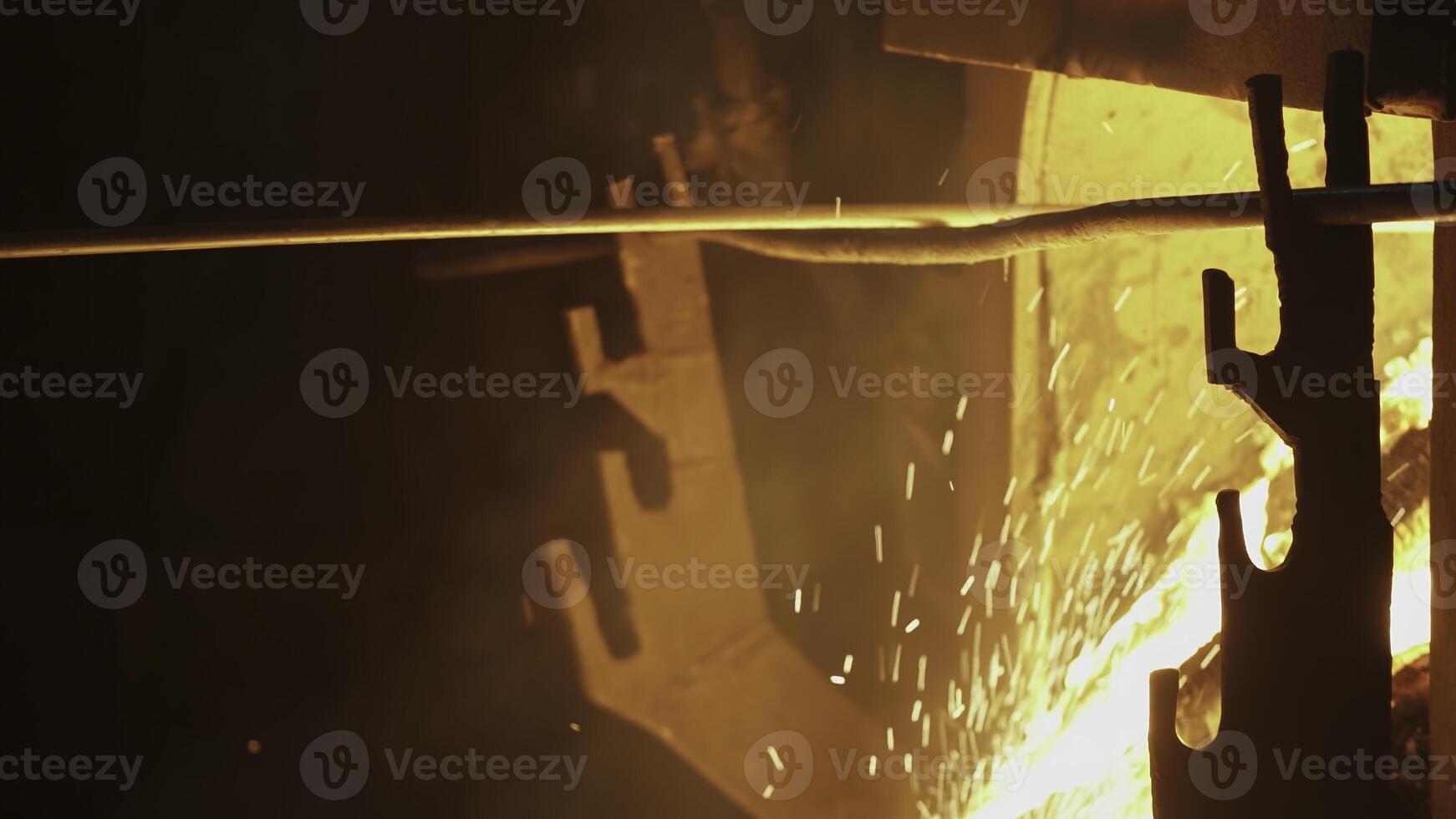The Fiery Sparks emerging during the intricate Metalworking Process showcase precise craftsmanship. Stock Clip photo