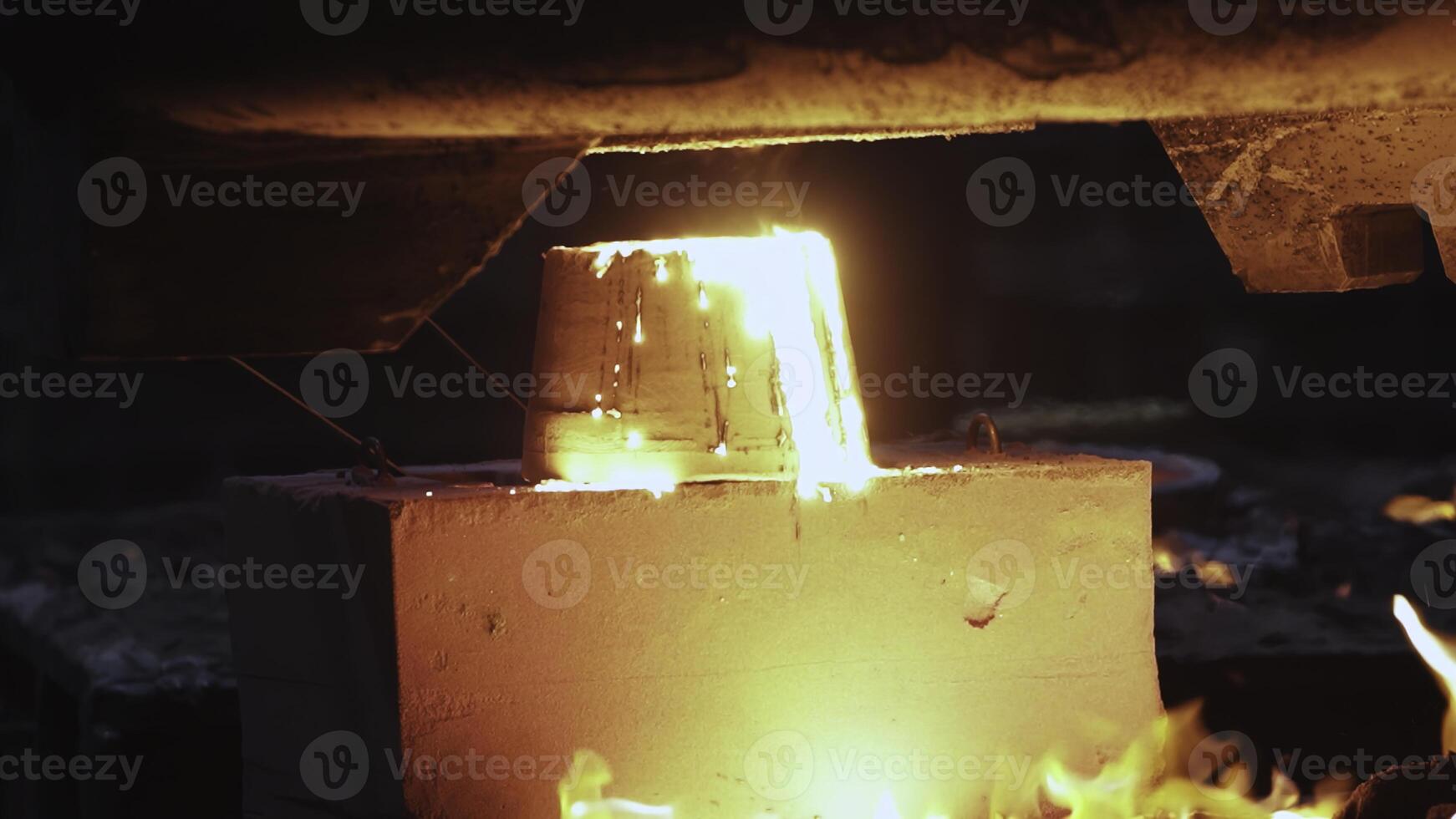 The Intense Metal Casting Process Involves Enormous Flames and Numerous Sparks Flying Around. Stock Clip photo