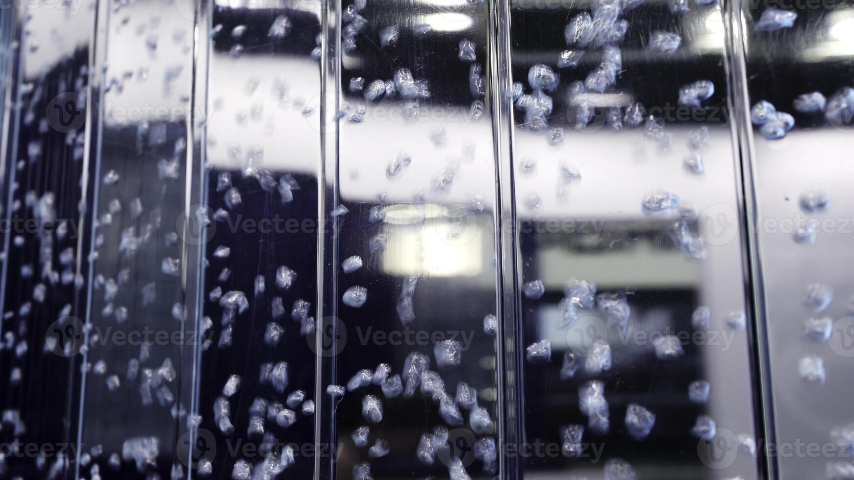An Artistic Abstract Bubble Reflection onto a Liquid Surface with a Variety of Elements. Media photo