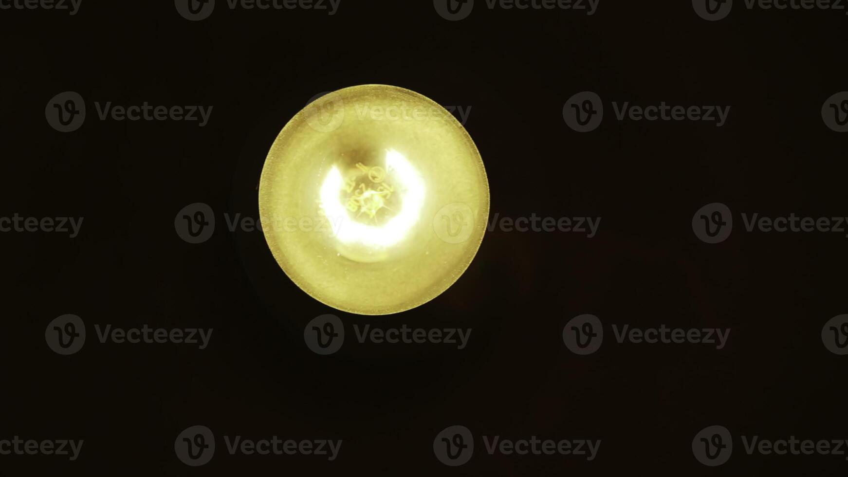 Stunning Illuminated Ceiling Light that Radiates Warmth Against a Beautiful Background. Stock Clip photo