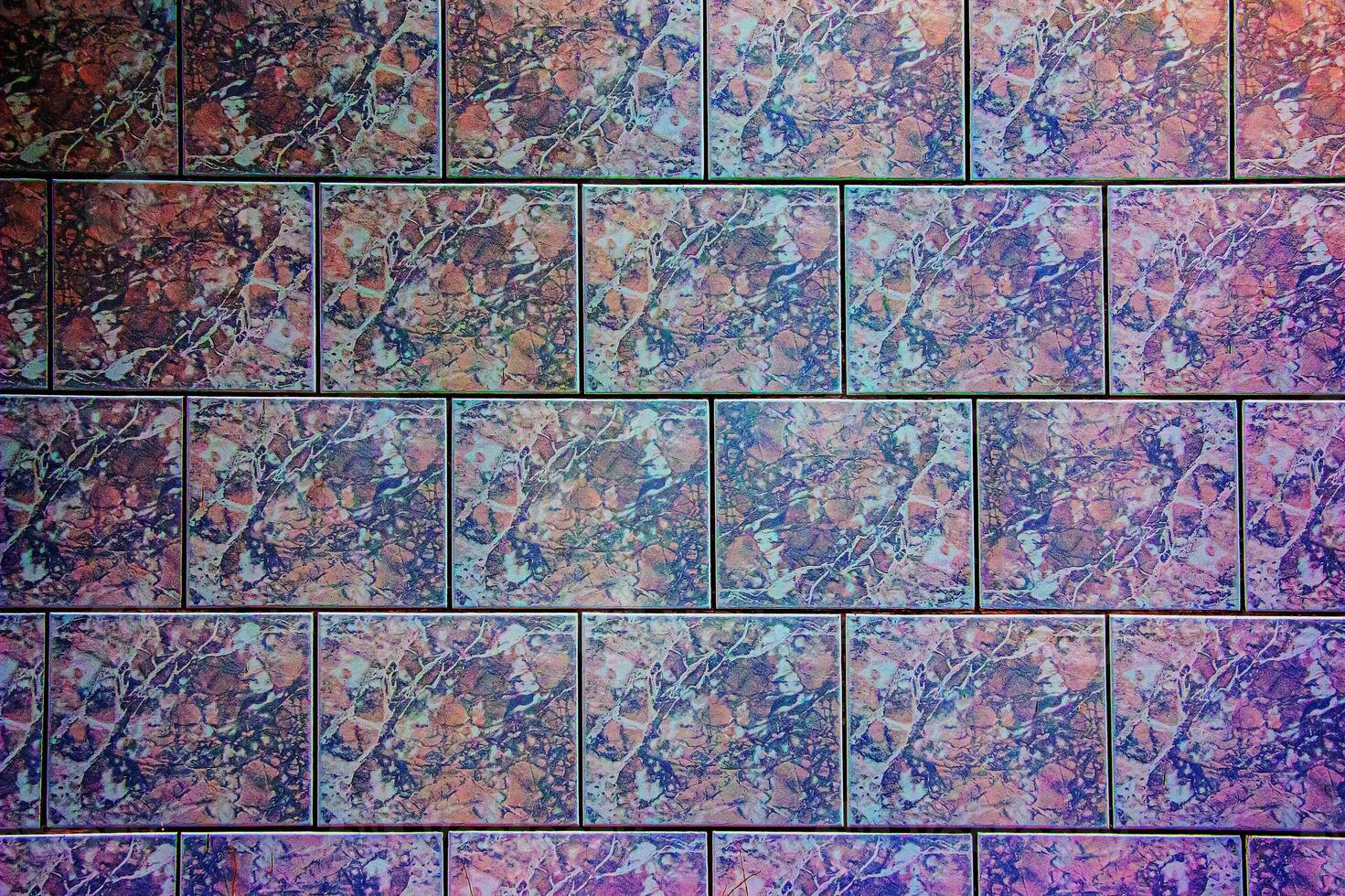 Ceramic tiles in purple-gray tones. Background or texture photo