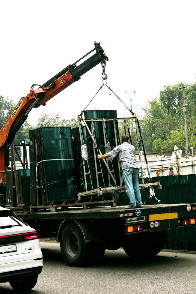 Dnepropetrovsk, Ukraine - 07.30.2021 Loading glass blocks into a special machine. photo