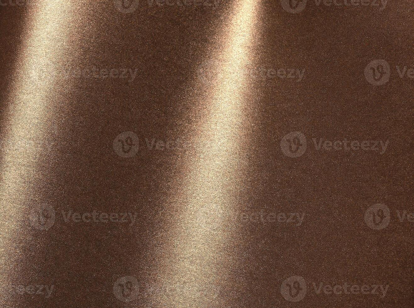 Glossy dark brown paper background with a subtle sparkle and elegant texture. Shiny and smooth photo