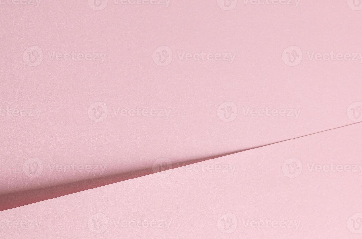 Pink paper background with a soft matte texture and subtle gradient. Minimalistic and elegant design photo