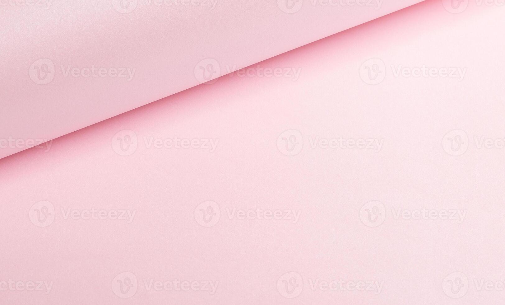 Pink paper background with a soft matte texture and minimalistic design. Featuring clean folds and a photo