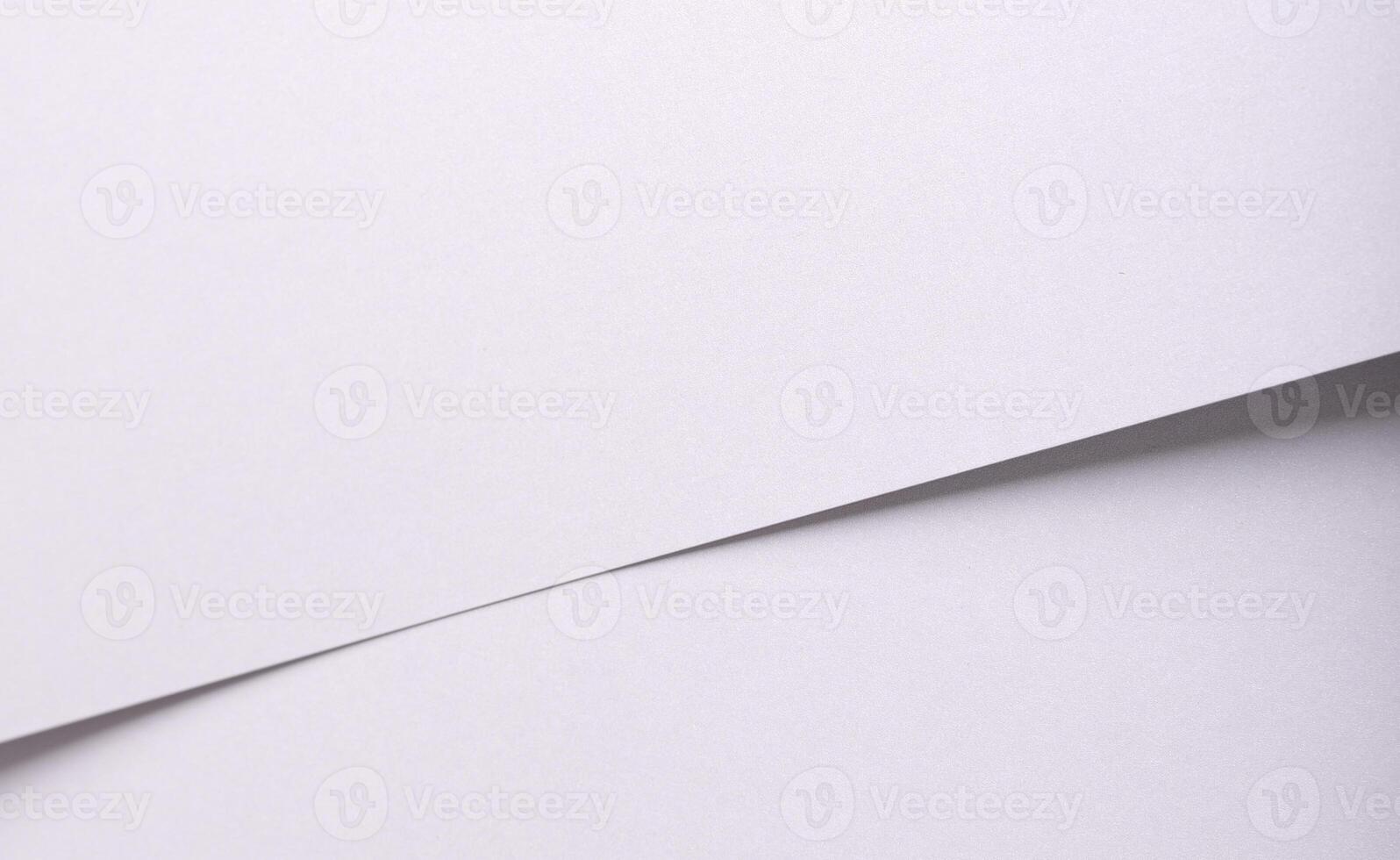 White matte paper background with a subtle grainy texture and clean surface. Featuring fine lines photo