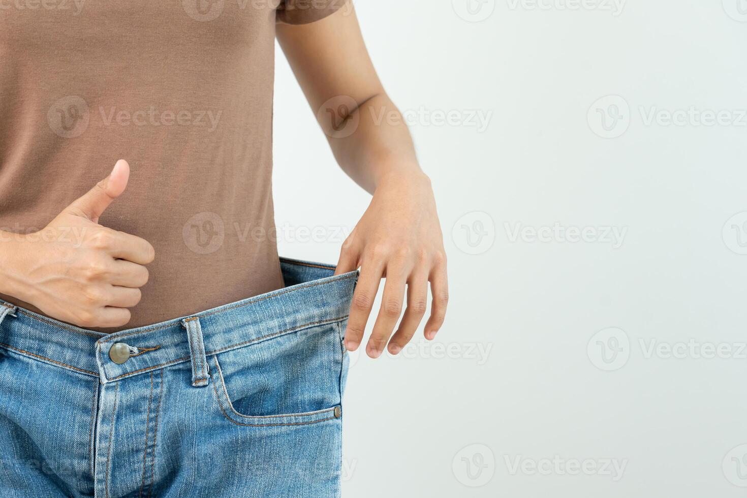 Diet woman on weight scale, results of diet. Beautiful shape. reduced waist size after under going a weight loss corse. balance, control, routines, exercise photo