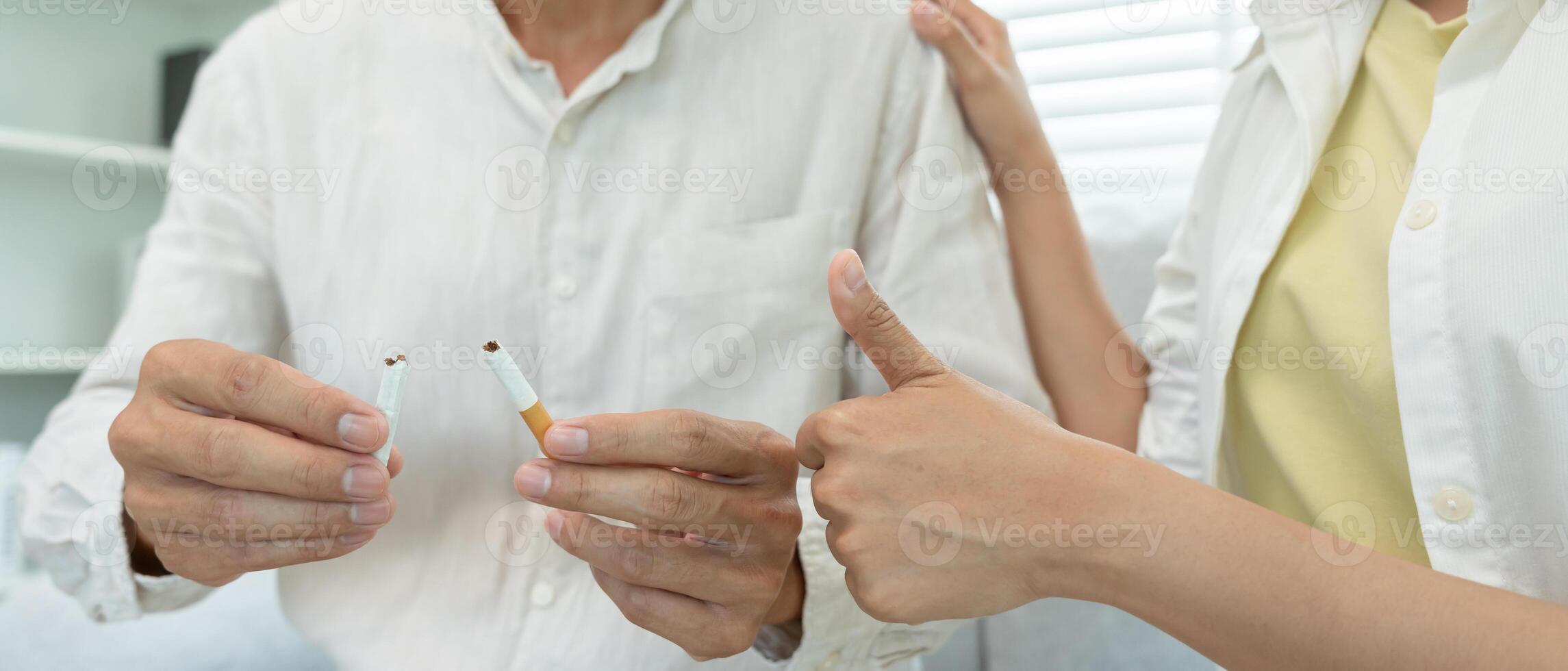 No smoking. Man stop smoke, refuse, reject, destroy, smash cigarette, say no. quit smoking for health. world tobacco day. drugs, Lung Cancer, Respiratory, Pulmonary disease, narcotic, nicotine photo