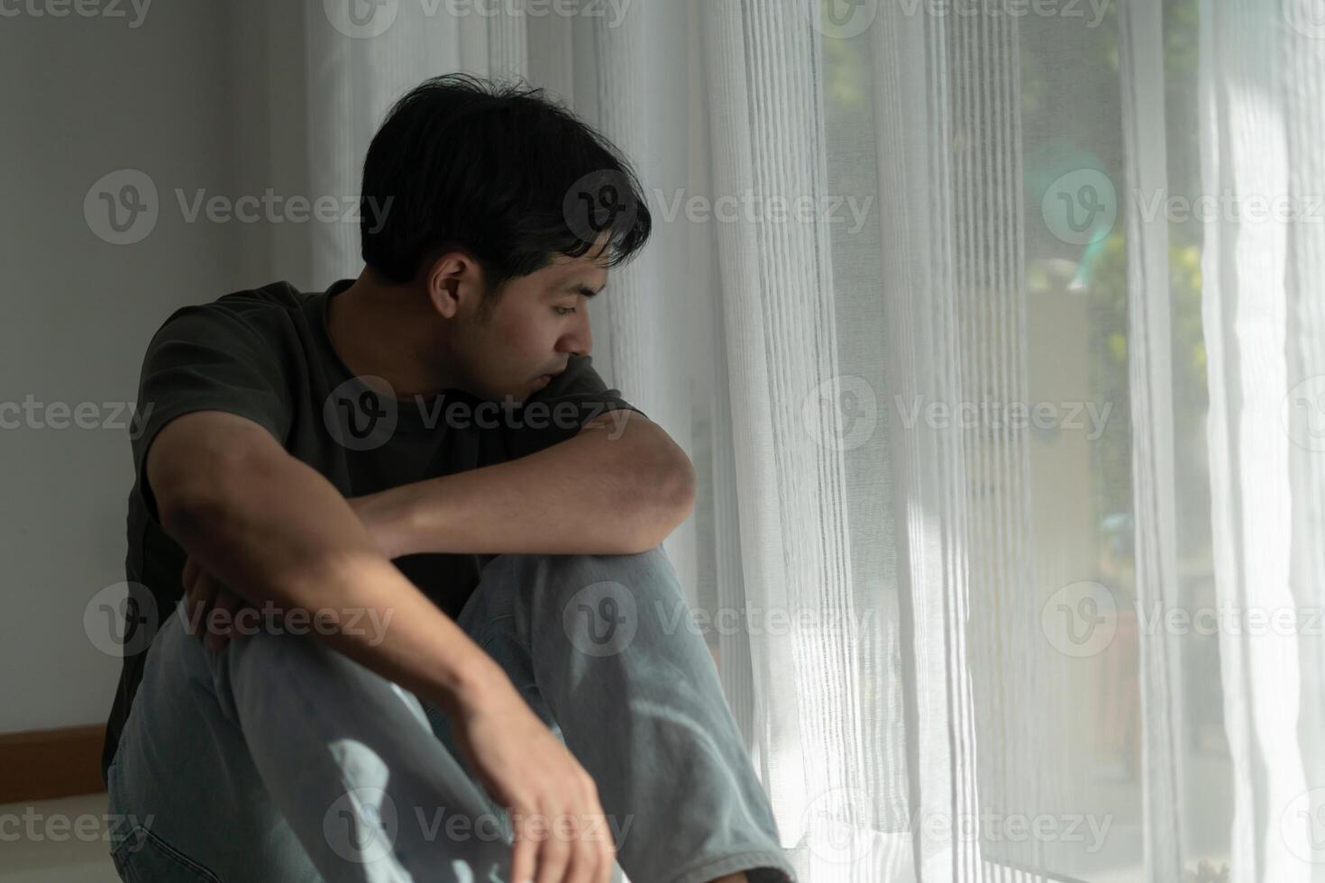 Depression and mental illness. man disappoint, sad after receive bad news. Stressed boy confused with unhappy problem, arguing with girlfriend, cry and worry about unexpected work, down economy. photo