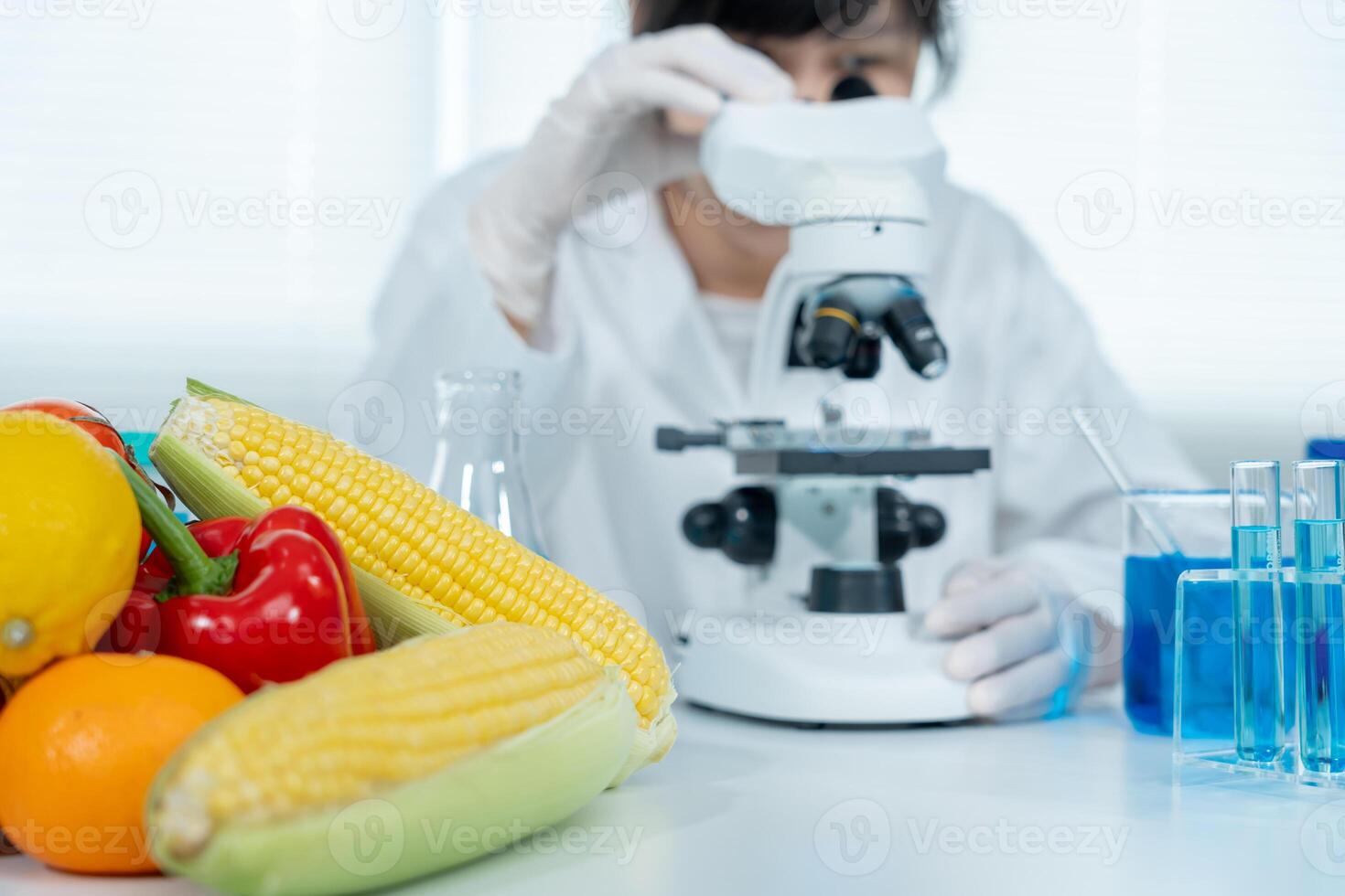 Scientist check chemical food residues in laboratory. Control experts inspect quality of fruits, vegetables. lab, hazards, ROHs, find prohibited substances, contaminate, Microscope, Microbiologist photo
